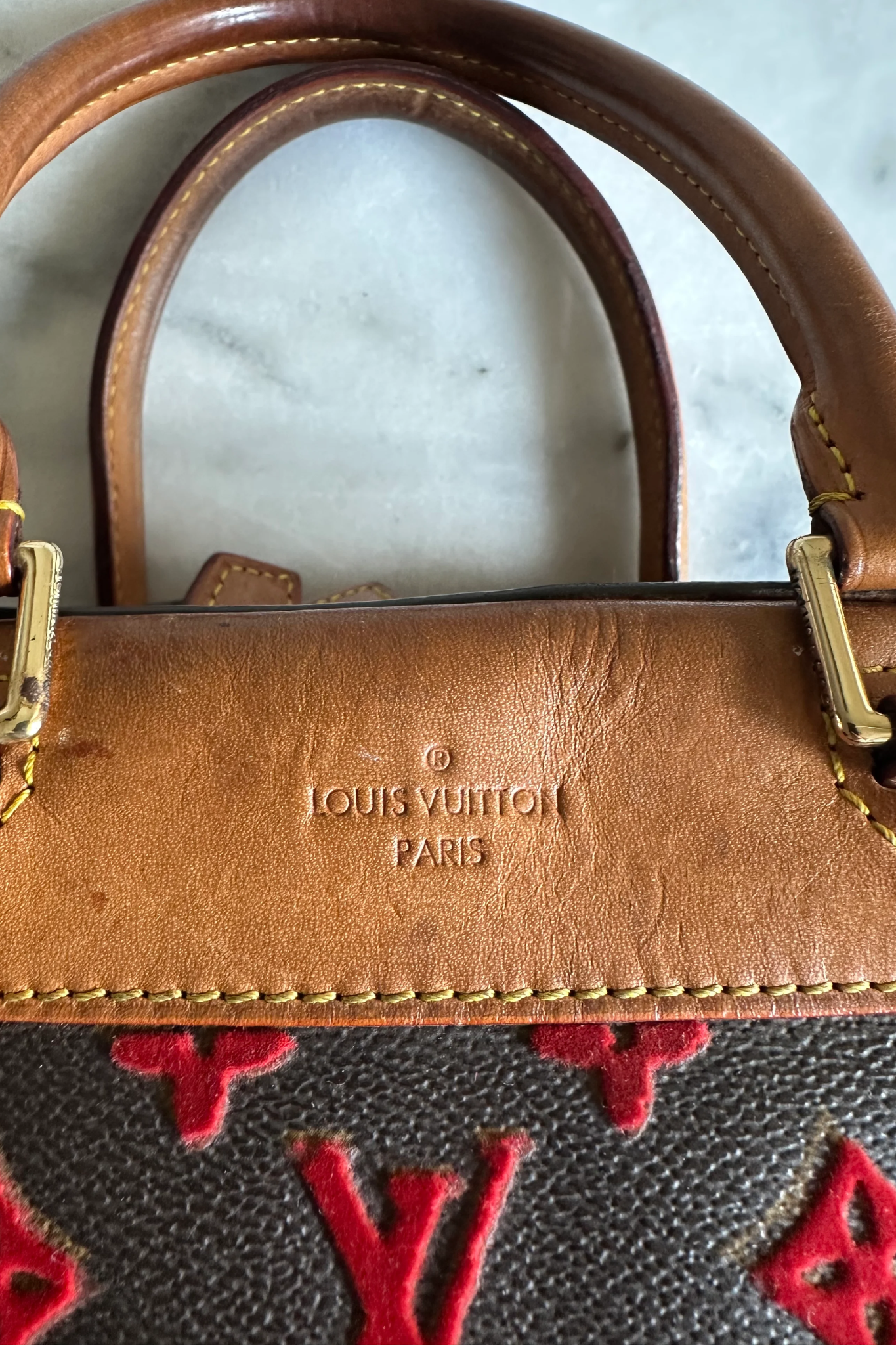 Louis Vuitton rouge monogram Tuffetage Deauville bag